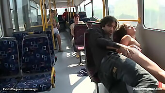 A European Woman Engages In Sexual Activity On A Public Bus In The City